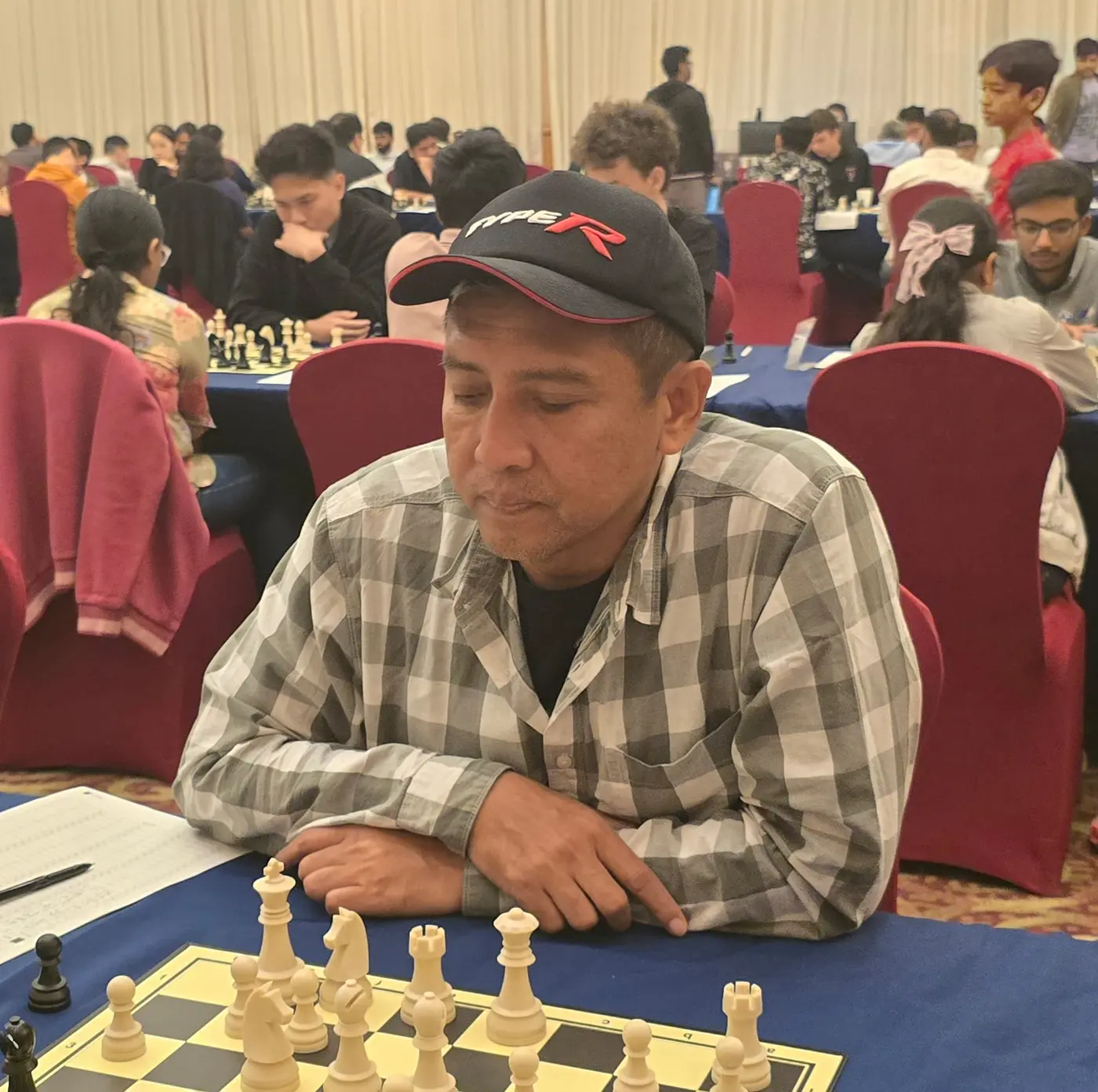 Tournament participant competing at the 1st Berjaya Global Chess Open 2026 — photo 10