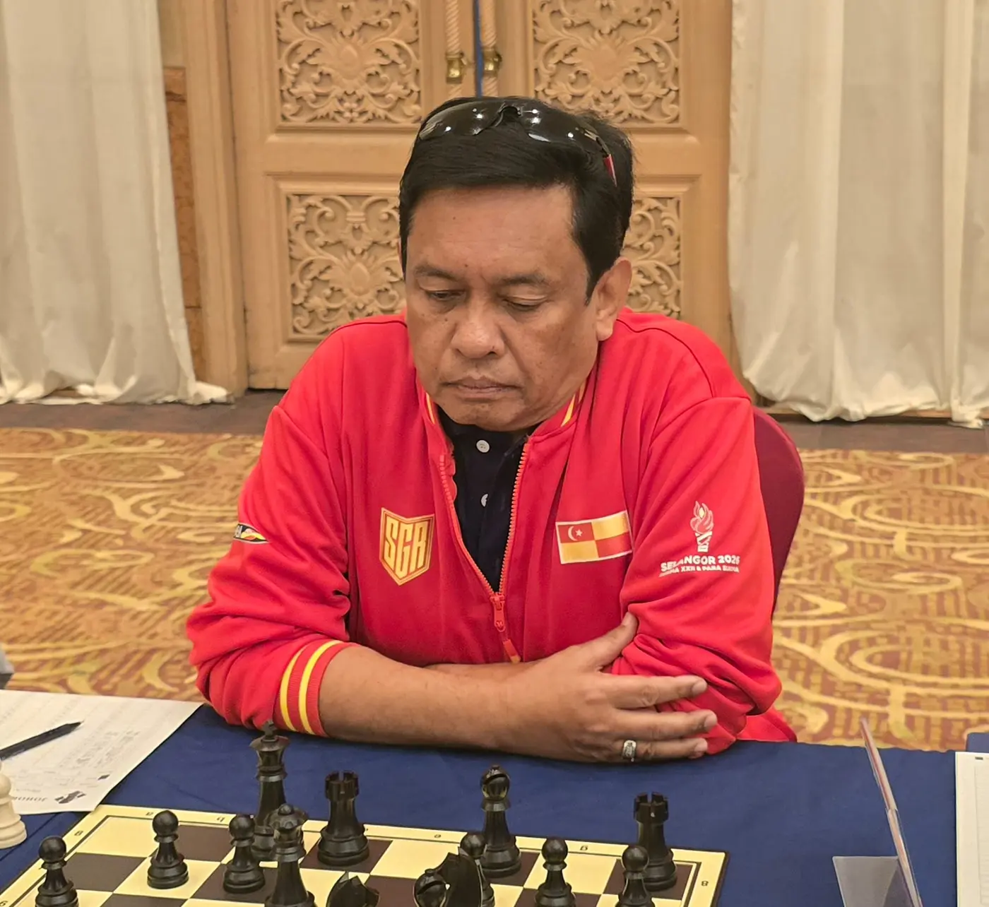 Tournament participant competing at the 1st Berjaya Global Chess Open 2026 — photo 15