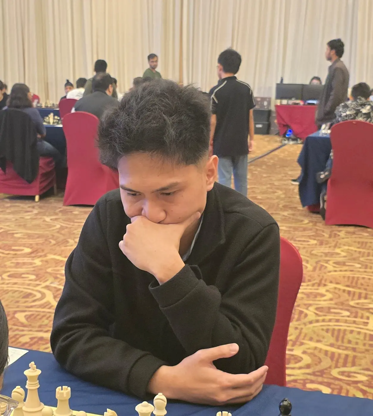 Tournament participant competing at the 1st Berjaya Global Chess Open 2026 — photo 25