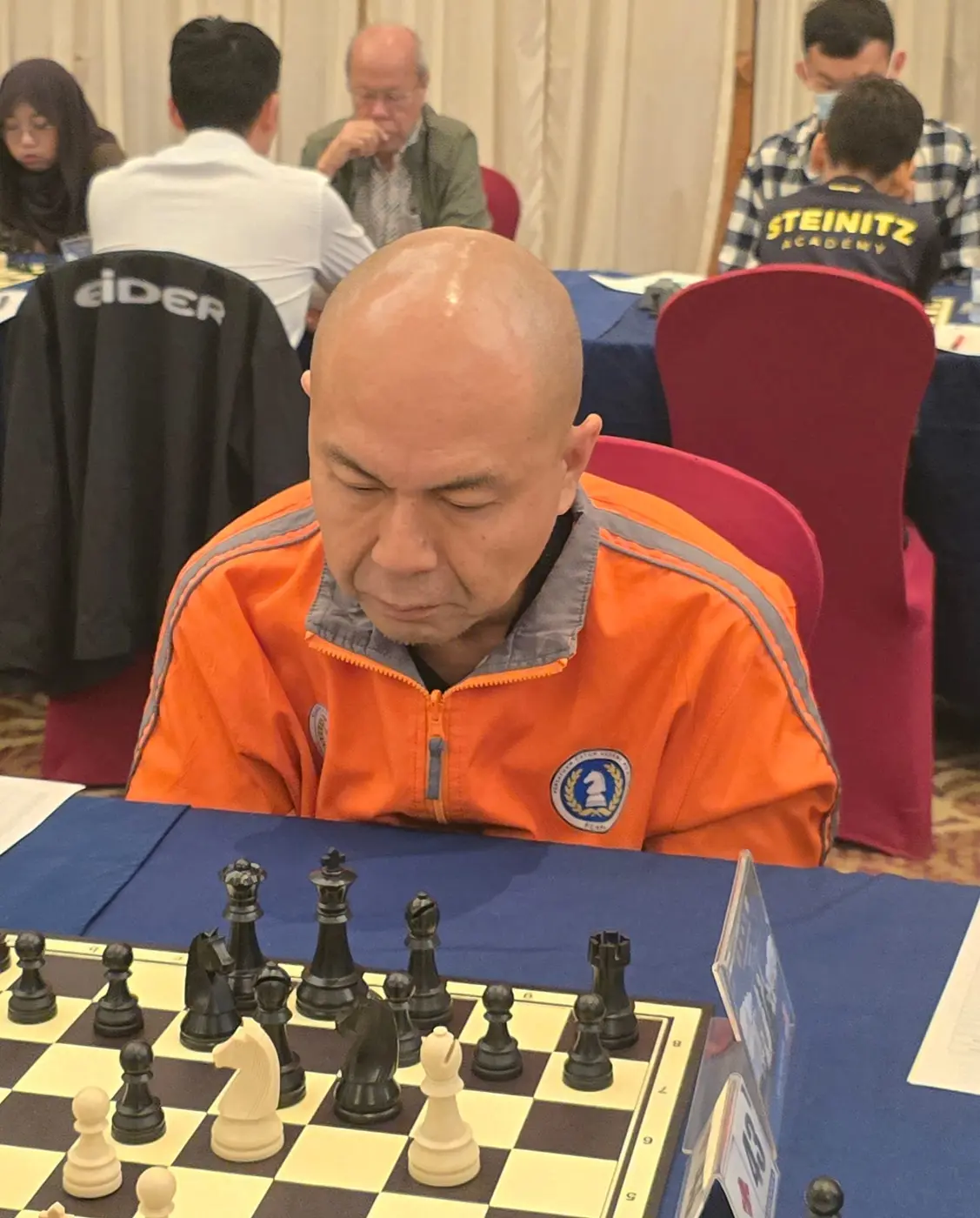 Tournament participant competing at the 1st Berjaya Global Chess Open 2026 — photo 36