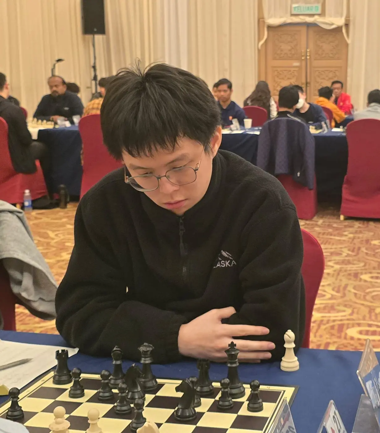Tournament participant competing at the 1st Berjaya Global Chess Open 2026 — photo 73