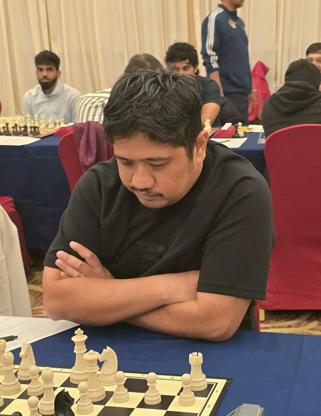 Tournament participant competing at the 1st Berjaya Global Chess Open 2026 — photo 87
