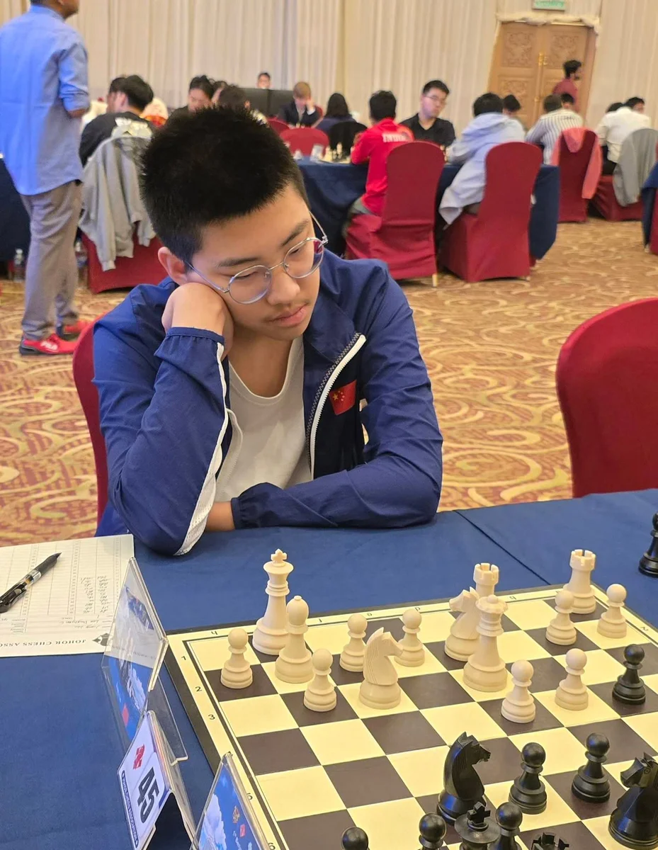 Participant in deep concentration at the 1st Berjaya Global Chess Open 2026